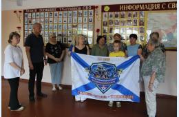 23.07.2026 Общественной организации "Росток" передали боевое Знамя  | Администрация муниципального округа город Партизанск Приморского края Официальный сайт